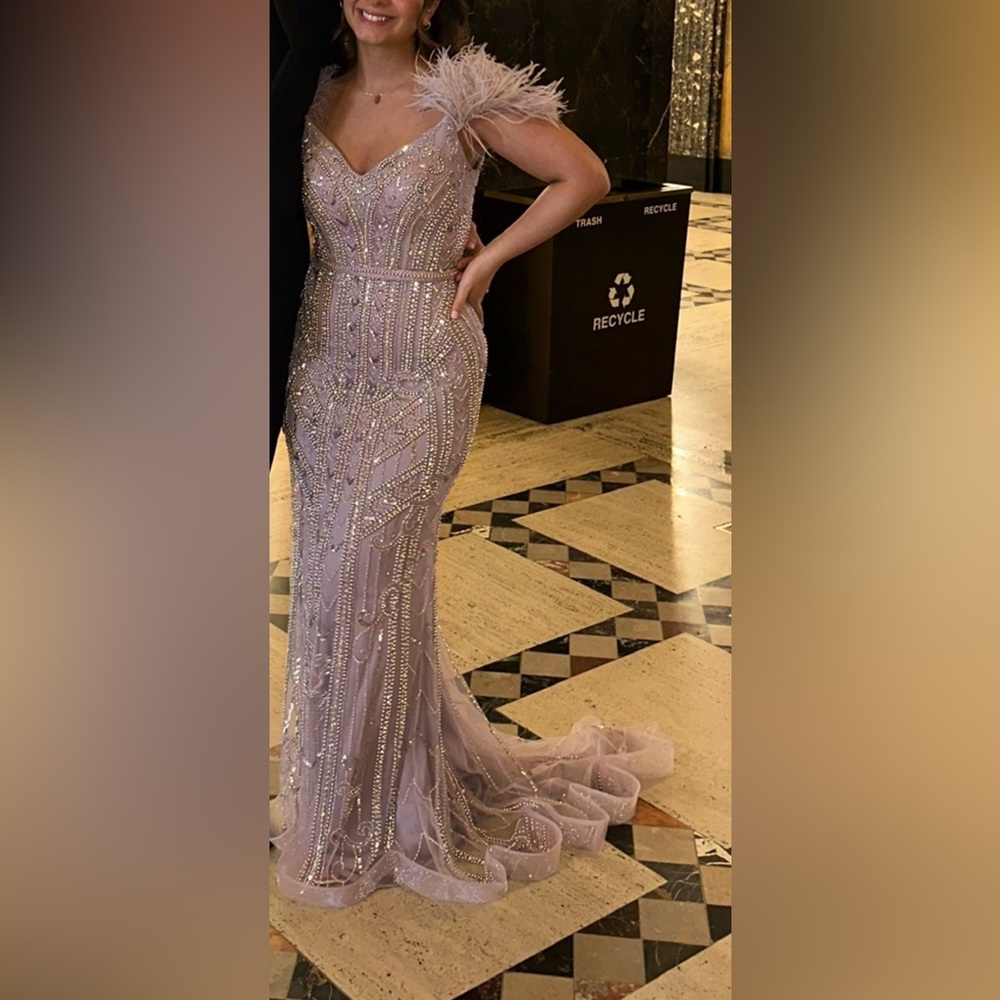 Floor length beaded formal gown.